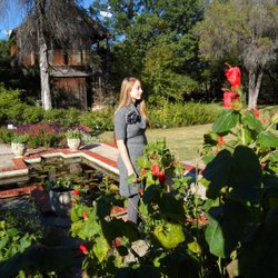 Weston Gardens In Bloom - My daughter at Weston Gardens in Bloom. WGIB does NOT sell Monarch-killing Asclepias curassavica, only good milkweed.