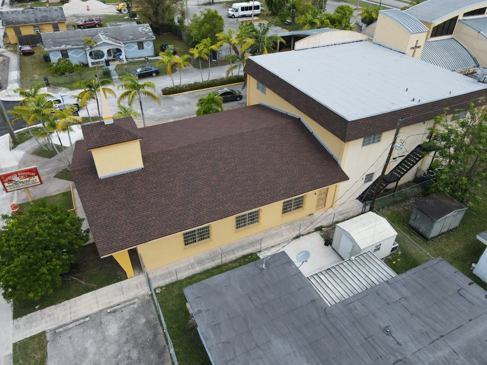 Slide of TJ Platinum Roofing