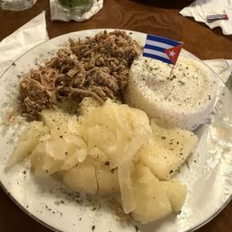 Lechón asado with yuca and white rice Lechón asado with yuca and white rice