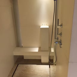 Awesome shower with a hidden perimeter floor drain.