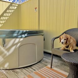 Secret Garden Inn & Cottages - Private hot tub.