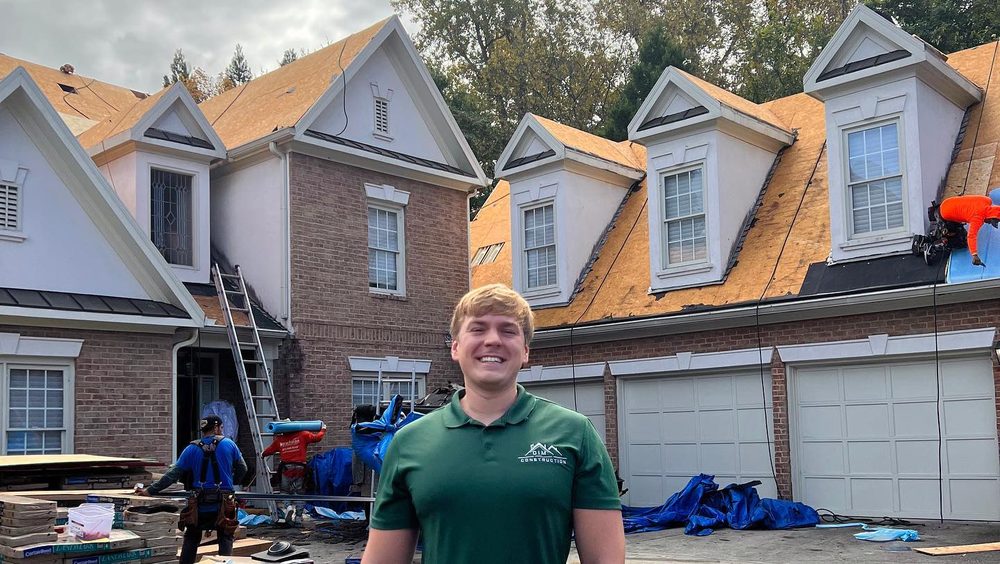 Slide of DIM Construction and Roofing