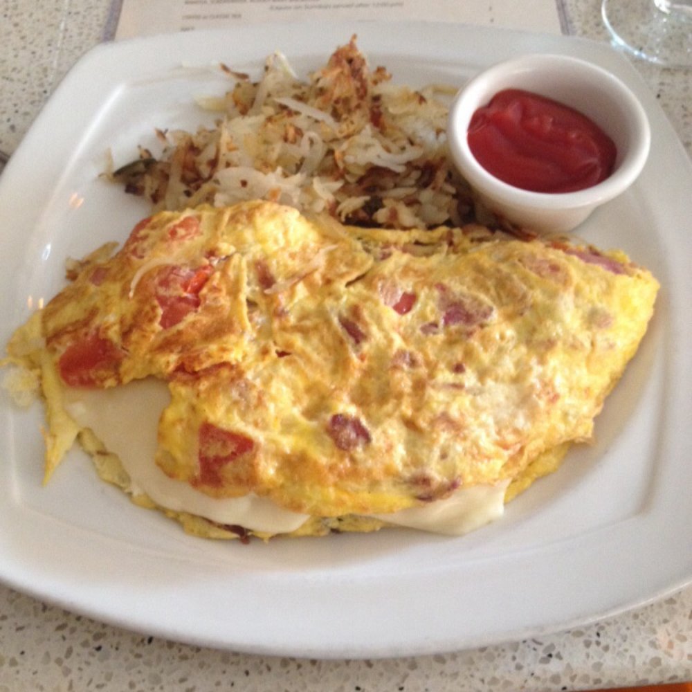 Veranda Restaurant & Cafe - Omelette with mootz cheese, tomatoes, bacon with side of potatoes - Mediterranean Near Me - Bayside, New York Veranda Restaurant & Cafe - Omelette with mootz cheese, tomatoes, bacon with side of potatoes - Mediterranean Near Me - Bayside, New York