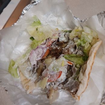 Super Gyros & Salads - 9/5/24 Beef & lamb gyro opened up with a  huge pile of protein   - happy, happy - Greek Near Me - Honolulu, Hawaii
