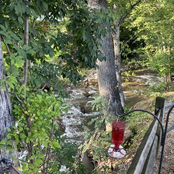 BearWaters Brewing Company - A stream runs along the back where there is outdoor seating - Thai Near Me - Maggie Valley, North Carolina