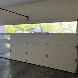 Expert Garage Door Service - Amarr 3138 flush panel model, wicker tan color, long panel dark tint windows