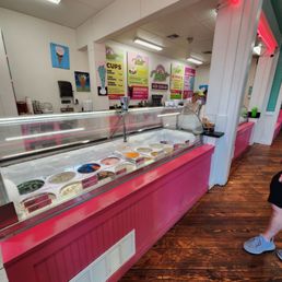 a woman standing in front of the counter a woman standing in front of the counter