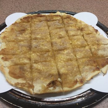 Red's Pizzeria - Red's apple pie dessert pizza. Like a cross between a sugar cookie, a cinnamon-sugar tortilla, and an apple pie. - Pizza Near Me - Eureka Springs, Arkansas Red's Pizzeria - Red's apple pie dessert pizza. Like a cross between a sugar cookie, a cinnamon-sugar tortilla, and an apple pie. - Pizza Near Me - Eureka Springs, Arkansas