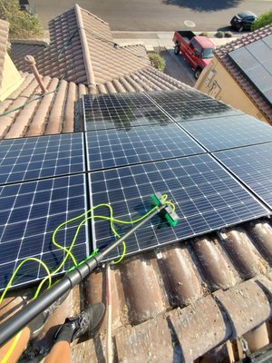 Solar Panel Cleaning - Our method to clean the panels is a pure De-Ionized water filter accompanied by a delicate water fed brush, to achieve the greatest efficiency from the solar panel systems. Solar Panel Cleaning - Our method to clean the panels is a pure De-Ionized water filter accompanied by a delicate water fed brush, to achieve the greatest efficiency from the solar panel systems.