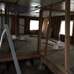 Sun Pacific Services - Demo without an inspection, see remenants of flooring and sheetrock on walls
