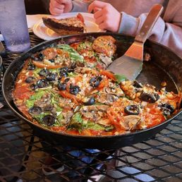 Large pizza w/ garlic, black, olives, mushrooms, tomatoes, and spinach.