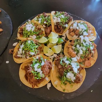 Somos Oaxaca - Street tacos, starting from the top and going clockwise, Asada, chicken, birria and carnitas. - Mexican Near Me - Los Angeles, California Somos Oaxaca - Street tacos, starting from the top and going clockwise, Asada, chicken, birria and carnitas. - Mexican Near Me - Los Angeles, California