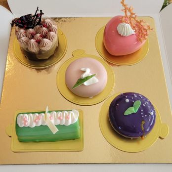 The Spoon - Left: Ganache Dulce Le Leche; Durian Mousse; Center: Oreo Jasmine Mousse; Bottom Right: Ube Cheesecake; Bottom Left: Matcha Tiramisu - Desserts Near Me - Stanton, California The Spoon - Left: Ganache Dulce Le Leche; Durian Mousse; Center: Oreo Jasmine Mousse; Bottom Right: Ube Cheesecake; Bottom Left: Matcha Tiramisu - Desserts Near Me - Stanton, California