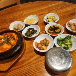 Soft tofu soup with banchan so yum! Soft tofu soup with banchan so yum!