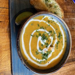 a bowl of soup and bread a bowl of soup and bread