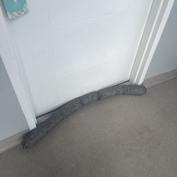 Attempt to keep water from going under the door. Attempt to keep water from going under the door.