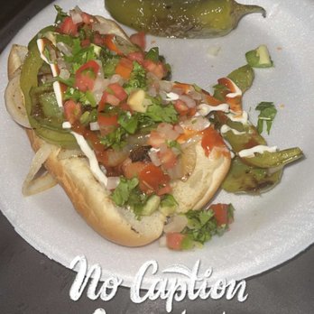 Los Rico Hotdogs - a white plate with a hot dog and a pickle - Food Stands Near Me - Riverside, California Los Rico Hotdogs - a white plate with a hot dog and a pickle - Food Stands Near Me - Riverside, California