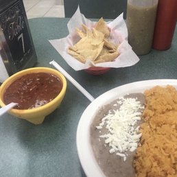 Spicy fresh salsa and chips. Rice and beans with Chorizo con huevos Spicy fresh salsa and chips. Rice and beans with Chorizo con huevos
