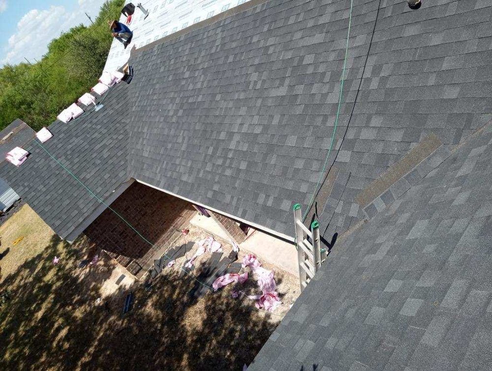 Slide of Adan’s Roofing & Construction