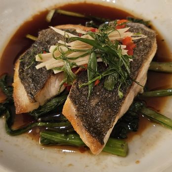 et al. - Grilled Kona Kanpachi ($37) came skin-on (a personal no-go) with pak choy, sizzling chili soy broth, cilantro, garlic rice. - Breakfast & Brunch Near Me - Honolulu, Hawaii