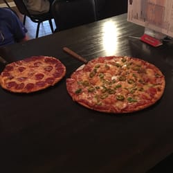 Rounders Pizza Too - Large Hawaiian pizza and small pepperoni.