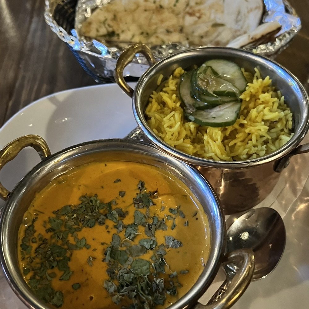 The Nomad - Butter chicken, basmati rice, tandoori grilled Naan - Tapas/Small Plates Near Me - Hillsborough, North Carolina The Nomad - Butter chicken, basmati rice, tandoori grilled Naan - Tapas/Small Plates Near Me - Hillsborough, North Carolina