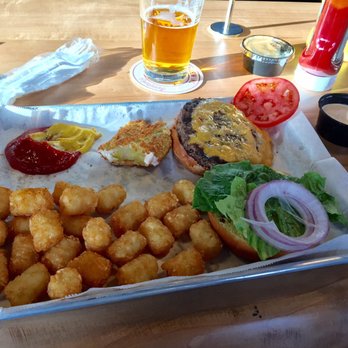 Braselton Brewing - Pimento cheese burger with fried green tomato and a ton of tots. - Breweries Near Me - Braselton, Georgia Braselton Brewing - Pimento cheese burger with fried green tomato and a ton of tots. - Breweries Near Me - Braselton, Georgia