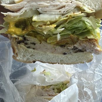Ernie's Market - Double meat: turkey & pastrami, lettuce, pickles, Swiss, mustard, love spice on an onion bun - Sandwiches Near Me - Oak Park, Michigan Ernie's Market - Double meat: turkey & pastrami, lettuce, pickles, Swiss, mustard, love spice on an onion bun - Sandwiches Near Me - Oak Park, Michigan