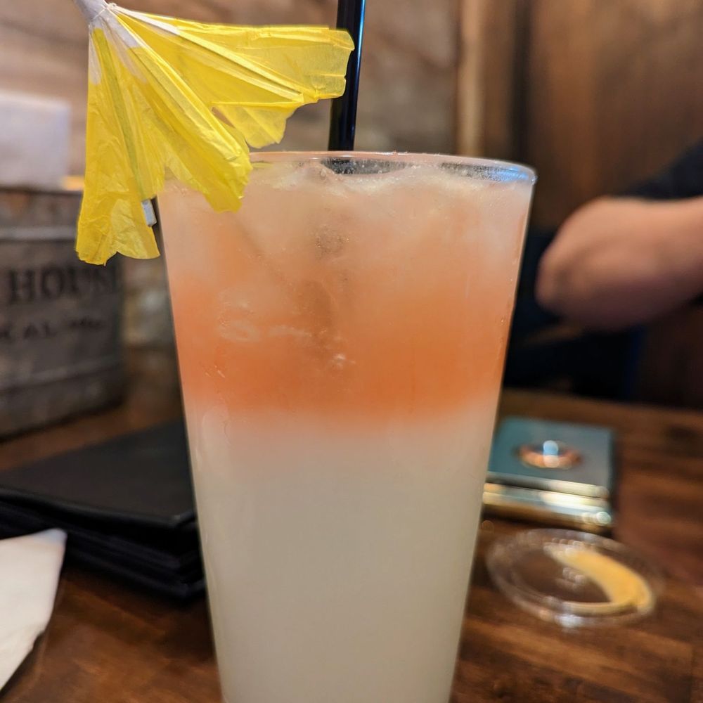 River City Ale House and Eatery - a drink with a pineapple garnish - Bars Near Me - Dixon, Illinois River City Ale House and Eatery - a drink with a pineapple garnish - Bars Near Me - Dixon, Illinois