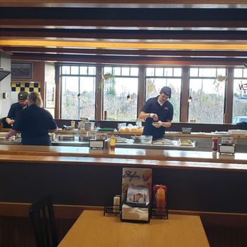 Skyline Chili - a view of a restaurant counter with a couple of people in the background - Hot Dogs Near Me - Mason, Ohio