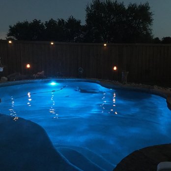 TLC Pools and Spas - Nighttime blue lit pool - Landscaping Near Me TLC Pools and Spas - Nighttime blue lit pool - Landscaping Near Me