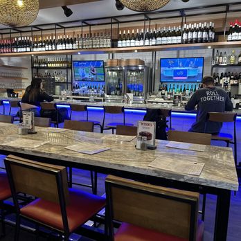 Lake Wine Kitchen + Bar - eople sitting at the bar - Wine Bars Near Me - Saint Paul, Minnesota