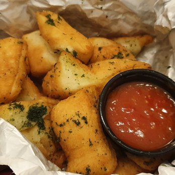 East Side Mario's - a basket of fried potatoes and ketchup - American Near Me - East Gwillimbury, Ontario East Side Mario's - a basket of fried potatoes and ketchup - American Near Me - East Gwillimbury, Ontario