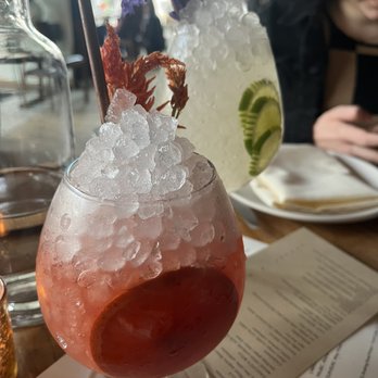 Martina - Mastiha Spritz (gin and tonic in background) - Argentine Near Me - Minneapolis, Minnesota