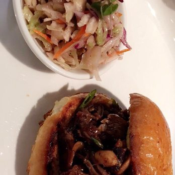 One Flew South - Pulled duck sandwich with a side of slaw - New American Near Me - Atlanta, Georgia One Flew South - Pulled duck sandwich with a side of slaw - New American Near Me - Atlanta, Georgia