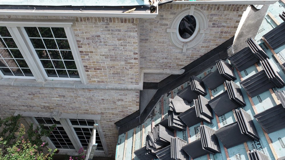 Slide of Good Guys Roofing