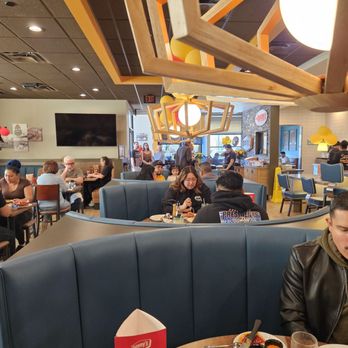 Denny's - a man and a woman eating in a restaurant - Breakfast & Brunch Near Me - Cathedral City, California Denny's - a man and a woman eating in a restaurant - Breakfast & Brunch Near Me - Cathedral City, California
