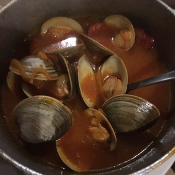 Portas Da Cidade - Spanish style little necks with chorico, peppers, and onions. Most was eaten before the pic. Ridiculously good - Portuguese Near Me - Westport, Massachusetts