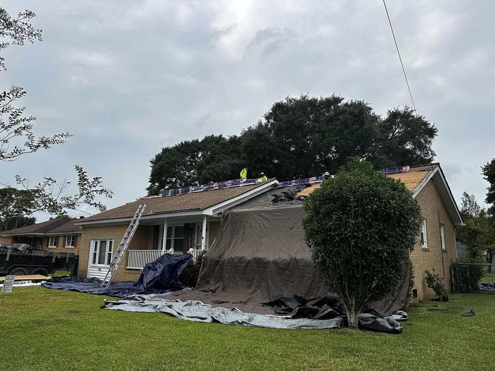 Slide of Woody's Roofing