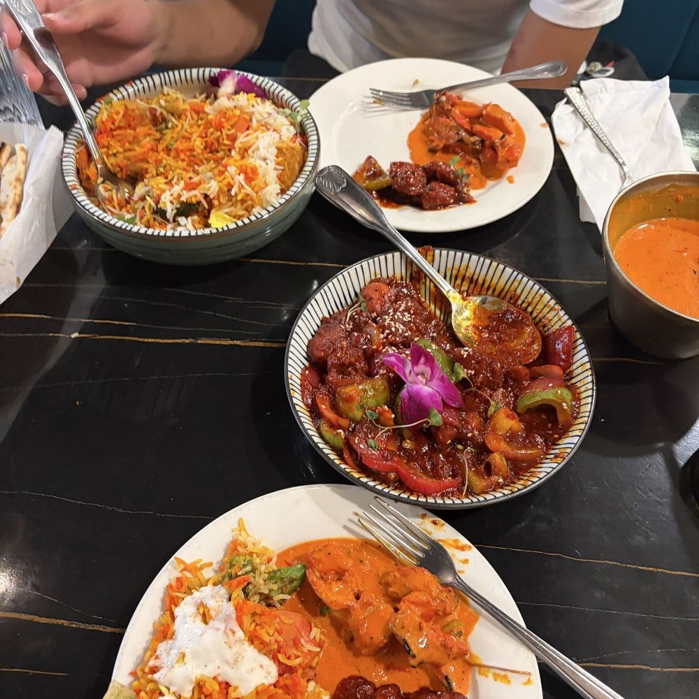 Biryani with Vegetables Chilli Stir-fry Curry Butter Chicken Garlic Naan Biryani with Vegetables Chilli Stir-fry Curry Butter Chicken Garlic Naan