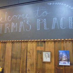 Irma's Place - A giant chalkboard sign in the dining room.