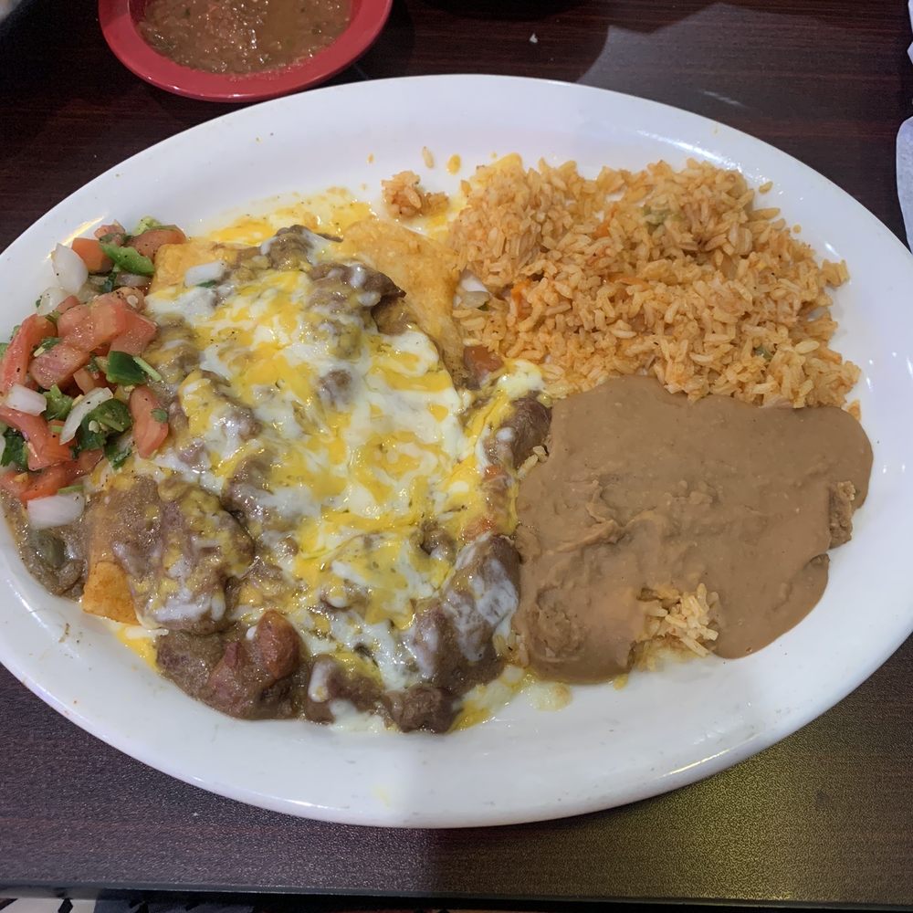 MasFajitas Mexican Restaurant - Mad Carne Guisada Enchilada., so great. The beef tips on top actually melted in my mouth - Mexican Near Me - caldwell, Texas MasFajitas Mexican Restaurant - Mad Carne Guisada Enchilada., so great. The beef tips on top actually melted in my mouth - Mexican Near Me - caldwell, Texas