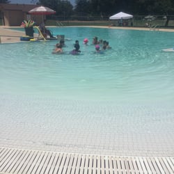 Lincoln Village Community Park & Pool - Braylon with his "Guppies" class. Pretty good class size-- 3 adults to 9 kiddos!