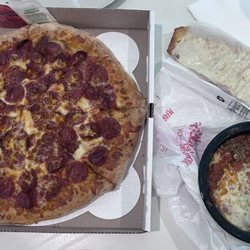 Shelby's Pizza - Pepperoni pizza and Lasagna. Lasagna comes with cheesy garlic bread.