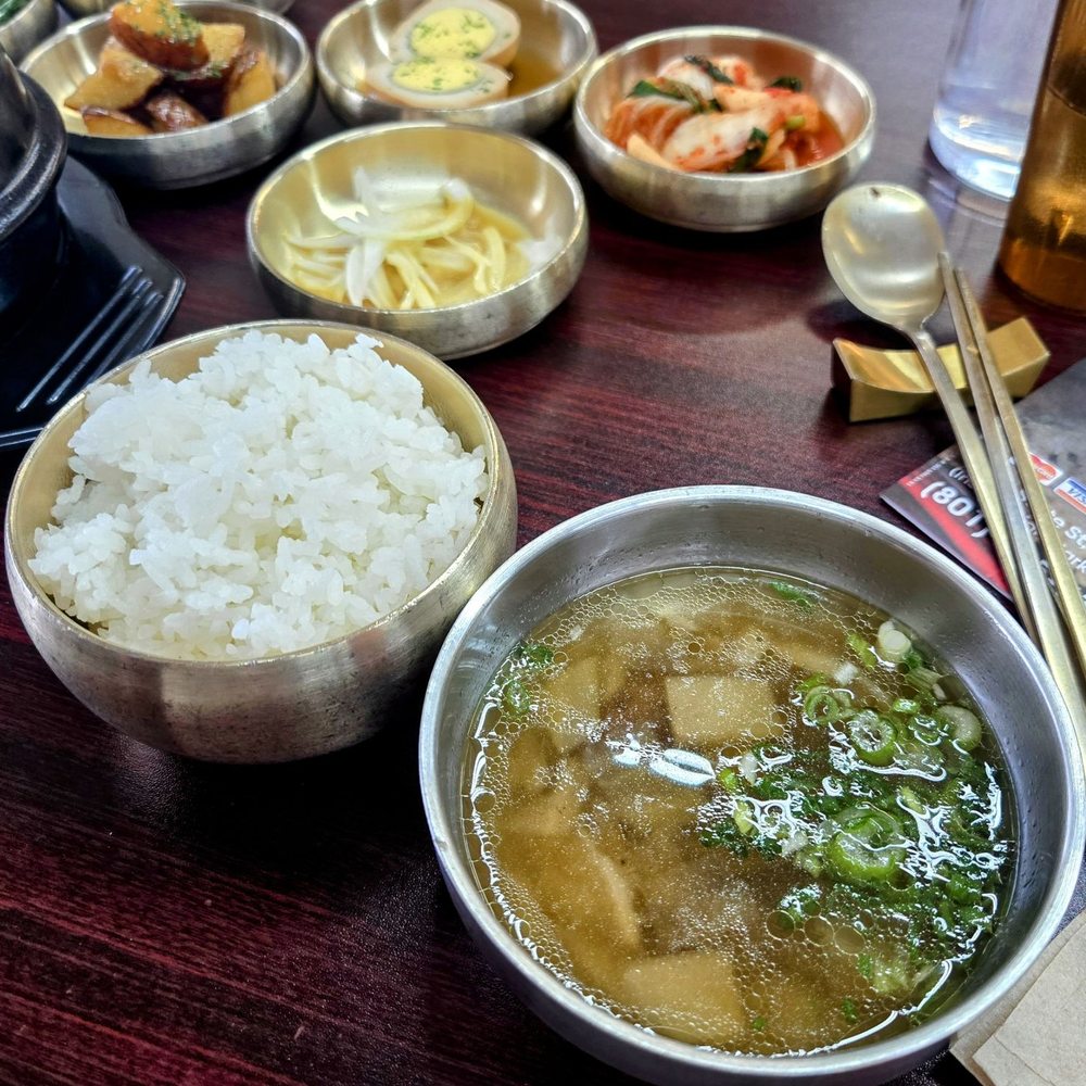 Guroott - Rice and a cup of savory beef broth with diakon radishes that come with the meal - Korean Near Me - Orem, Utah Guroott - Rice and a cup of savory beef broth with diakon radishes that come with the meal - Korean Near Me - Orem, Utah
