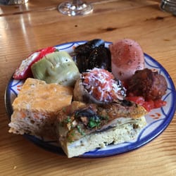 Barcarole - A full selection of tapas, the polish sausage, stuffed mushrooms, and homemade focaccia are especial favorites.