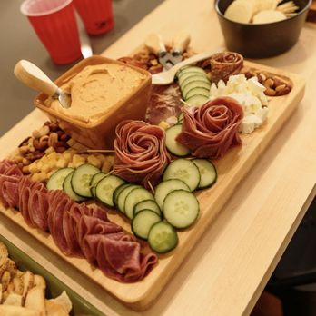 Brooklyns Finests - Variety of passion with food on a charcuterie board!! - Caterers Near Me