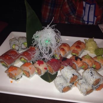sake bomb - Multi roll plate... From front to back: spicy tuna roll, rock n roll, fire roll, California roll. - Japanese Near Me - CICERO, New York sake bomb - Multi roll plate... From front to back: spicy tuna roll, rock n roll, fire roll, California roll. - Japanese Near Me - CICERO, New York