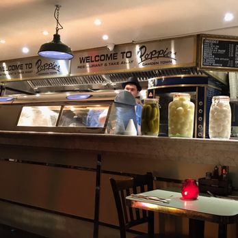 Poppies - Downstairs, take away counter with takeaway menu prices - Fish & Chips Near Me - London, XGL Poppies - Downstairs, take away counter with takeaway menu prices - Fish & Chips Near Me - London, XGL