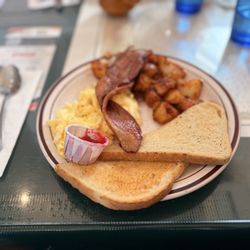 Hudson Point Cafe - Scrambled eggs, bacon, potatoes, and sourdough toast which